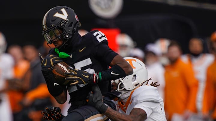 Vanderbilt cornerback Martel Hight (25) intercepts the ball intended for Tennessee wide receiver Dont'e Thornton Jr. (1)) during the second quarter at FirstBank Stadium in Nashville, Tenn., Saturday, Nov. 30, 2024.