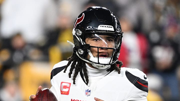 Jan 12, 2026; Pittsburgh, PA, USA; Houston Texans quarterback C.J. Stroud (7) drops to throw during the first half of an AFC Wild Card Round game against the Pittsburgh Steelers at Acrisure Stadium. Mandatory Credit: Barry Reeger-Imagn Images