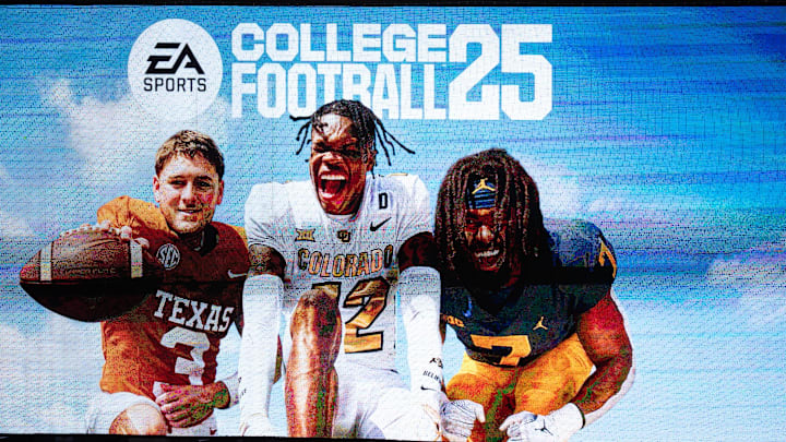 A commercial for the College Football 25 video game, featuring Texas Football quarterback Quinn Ewers plays during the fifth inning of the Longhorns' baseball game against the Kansas Jayhawks, Thursday, May 16, 2024 at UFCU Disch-Falk Field in Austin.