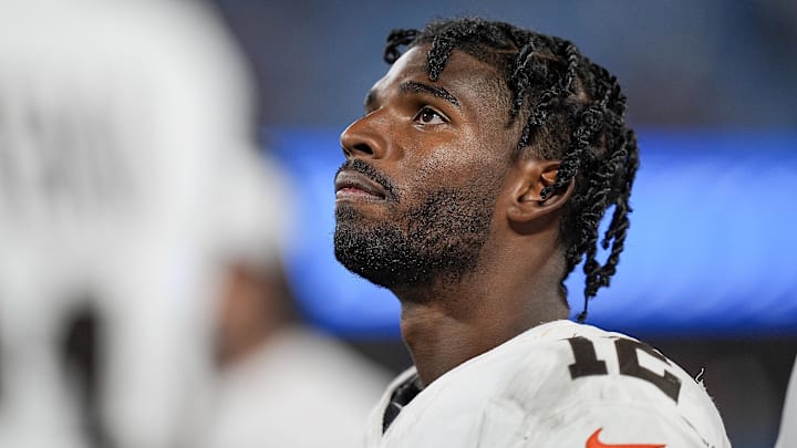 Aug 8, 2025; Charlotte, North Carolina, USA; Cleveland Browns quarterback Shedeur Sanders (12) looks at the scoreboard during the second half against the Carolina Panthers at Bank of America Stadium. Mandatory Credit: Jim Dedmon-Imagn Images