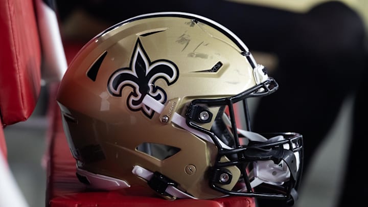 Aug 10, 2024; Glendale, Arizona, USA; Detailed view of a New Orleans Saints helmet during a preseason NFL game at State Farm Stadium. Mandatory Credit: Mark J. Rebilas-Imagn Images