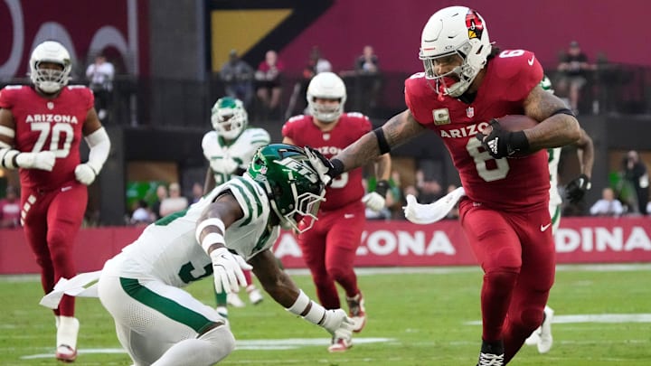 Arizona Cardinals running back James Conner (6) breaks a tackle by New York Jets safety Jalen Mills (35) after a catch during the first quarter at State Farm Stadium in Glendale, Ariz., on Sunday, Nov. 10, 2024. Arizona Cardinals running back James Conner (6) breaks a tackle by New York Jets safety Jalen Mills (35) after a catch during the first quarter at State Farm Stadium in Glendale, Ariz., on Sunday, Nov. 10, 2024.