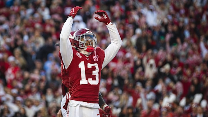 Nov 30, 2024; Tuscaloosa, Alabama, USA; Alabama Crimson Tide defensive back Malachi Moore (13) celebrates after a play against the Auburn Tigers during the second quarter at Bryant-Denny Stadium. Mandatory Credit: Will McLelland-Imagn Images