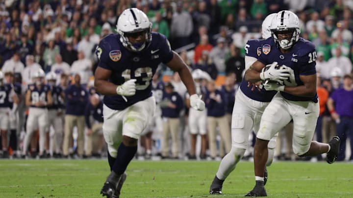 Penn State running back Nicholas Singleton carries the ball behind Kaytron Allen in the Orange Bowl against Notre Dame. Penn State running back Nicholas Singleton carries the ball behind Kaytron Allen in the Orange Bowl against Notre Dame.