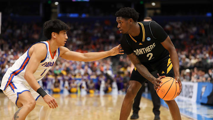Mar 20, 2026; Tampa, FL, USA; Florida Gators guard Xaivian Lee (1) defends Prairie View A&M Panthers guard Dontae Horne (2) in the first half during a first round game of the men's 2026 NCAA Tournament at Benchmark International Arena. Mandatory Credit: Matt Pendleton-Imagn Images
