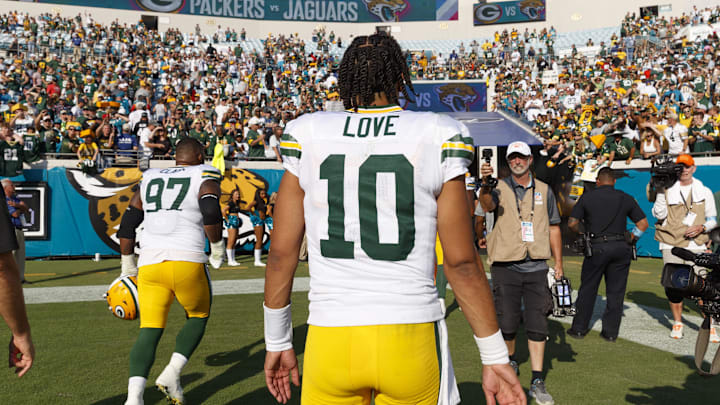 Green Bay Packers quarterback Jordan Love (10) heads to the locker room after a victory at the Jacksonville Jaguars.