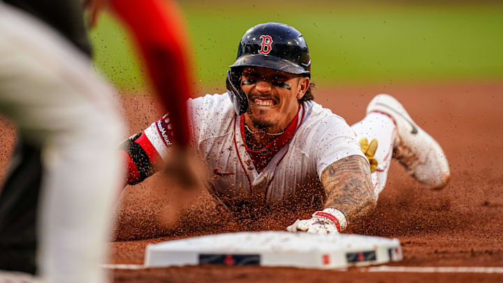 Apr 22, 2025; Boston, Massachusetts, USA; Boston Red Sox outfielder Jarren Duran (16) slides into third base for a triple against the Seattle Mariners in the first inning at Fenway Park. Mandatory Credit: David Butler II-Imagn Images Apr 22, 2025; Boston, Massachusetts, USA; Boston Red Sox outfielder Jarren Duran (16) slides into third base for a triple against the Seattle Mariners in the first inning at Fenway Park. Mandatory Credit: David Butler II-Imagn Images
