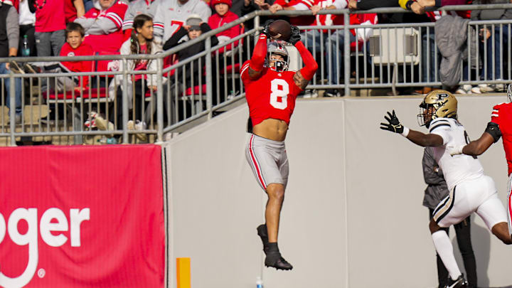 Nov 9, 2024; Columbus, Ohio, USA; Ohio State Buckeyes safety Lathan Ransom (8) intercepts a pass against the Purdue Boilermakers in the second half at Ohio Stadium. Mandatory Credit: Samantha Madar-Imagn Images Nov 9, 2024; Columbus, Ohio, USA; Ohio State Buckeyes safety Lathan Ransom (8) intercepts a pass against the Purdue Boilermakers in the second half at Ohio Stadium. Mandatory Credit: Samantha Madar-Imagn Images