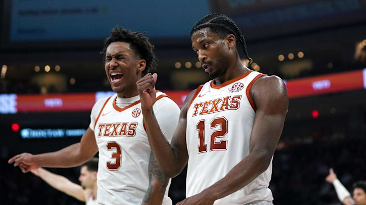Texas Longhorns guard Tramon Mark and forward Dailyn Swain react to a basket during the last few seconds of the game against the South Carolina Gamecocks at Moody Center.