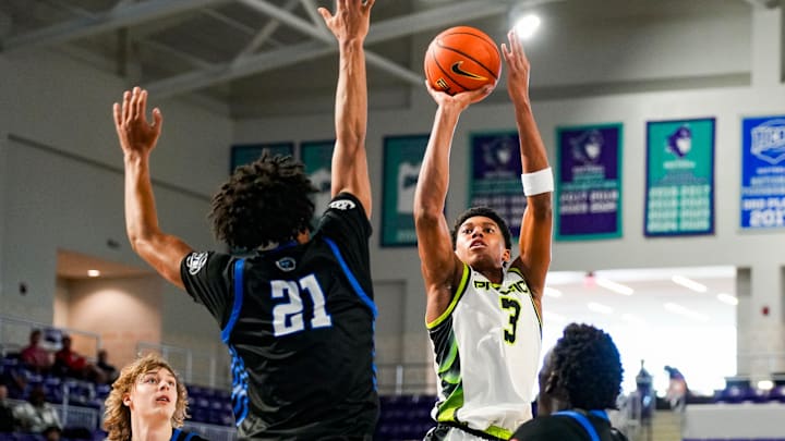 Prolific Prep Crew guard Bruce Branch II (3) shoots the ball over CIA-Bella Vista Bears guard Lyris Robinson (21) during the second quarter of a City of Palms Classic Signature Series game at Suncoast Credit Union Arena in Fort Myers, Fla., on Friday, Dec. 19, 2025.