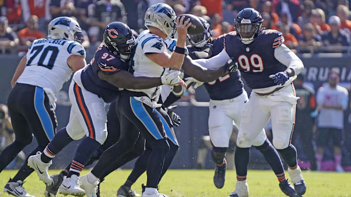Andrew Billings gets to Andy Dalton as Gervon Dexter closes in during last year's Bears win over the Panthers.