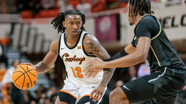 Feb 28, 2024; Stillwater, Oklahoma, USA; Oklahoma State Cowboys guard Javon Small (12) dribbles. Feb 28, 2024; Stillwater, Oklahoma, USA; Oklahoma State Cowboys guard Javon Small (12) dribbles.