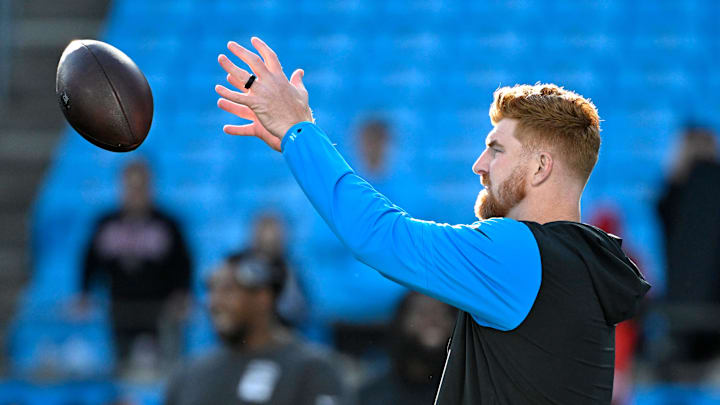 Dec 1, 2024; Charlotte, North Carolina, USA; Carolina Panthers quarterback Andy Dalton (14) warms up before the game at Bank of America Stadium. Mandatory Credit: Bob Donnan-Imagn Images