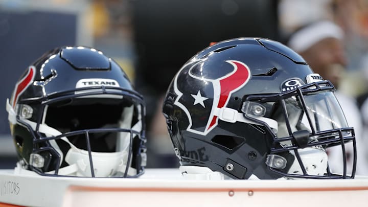 Aug 9, 2024; Pittsburgh, Pennsylvania, USA;  Houston Texans helmets sit on an equipment trunk during the second quarter against the Pittsburgh Steelers at Acrisure Stadium. Mandatory Credit: Charles LeClaire-Imagn Images