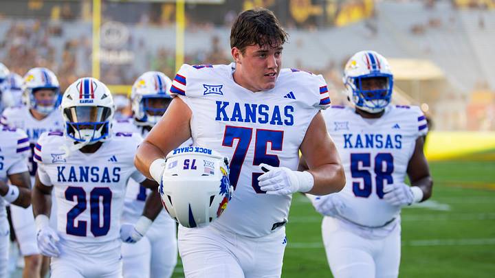 Oct 5, 2024; Tempe, Arizona, USA; Kansas Jayhawks offensive lineman Calvin Clements (75) against the Arizona State Sun Devils at Mountain America Stadium. Mandatory Credit: Mark J. Rebilas-Imagn Images Oct 5, 2024; Tempe, Arizona, USA; Kansas Jayhawks offensive lineman Calvin Clements (75) against the Arizona State Sun Devils at Mountain America Stadium. Mandatory Credit: Mark J. Rebilas-Imagn Images