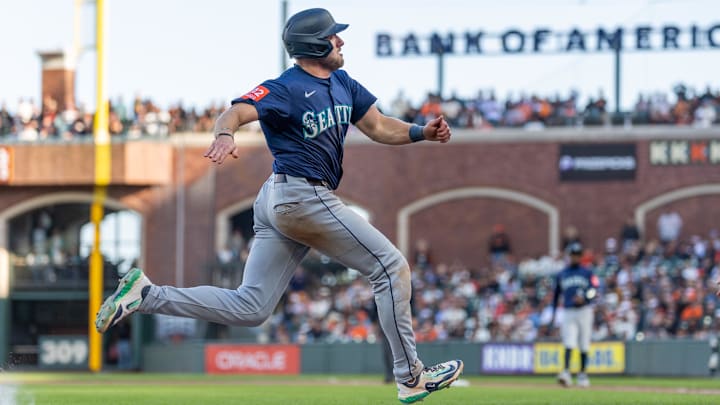 Seattle Mariners outfielder Luke Raley scores during a game against the San Francisco Giants on April 4 at Oracle Park. Seattle Mariners outfielder Luke Raley scores during a game against the San Francisco Giants on April 4 at Oracle Park.