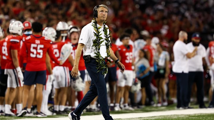 Sep 7, 2024; Tucson, Arizona, USA; Arizona Wildcats head coach Brent Brennan looks at score board against the Northern Arizona Lumberjacks during first quarter at Arizona Stadium. Sep 7, 2024; Tucson, Arizona, USA; Arizona Wildcats head coach Brent Brennan looks at score board against the Northern Arizona Lumberjacks during first quarter at Arizona Stadium.