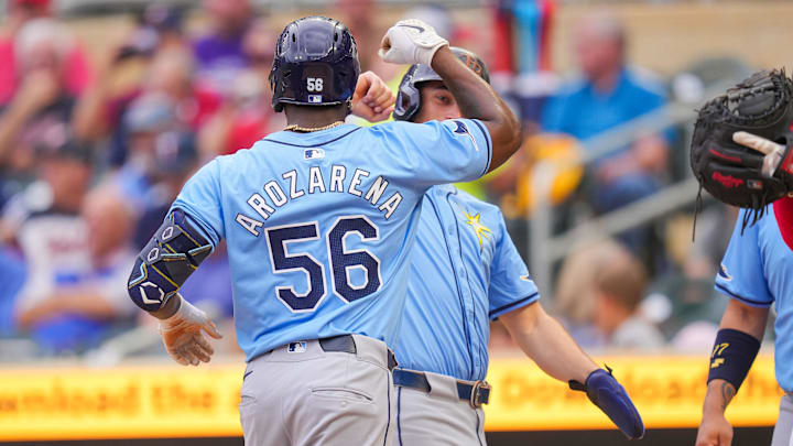 Jun 18, 2024; Minneapolis, Minnesota, USA; Tampa Bay Rays outfielder Randy Arozarena (56) celebrates his home run against the Minnesota Twins in the first inning at Target Field. Mandatory Credit: Brad Rempel-USA TODAY Sports
