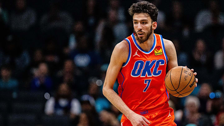 Apr 7, 2024; Charlotte, North Carolina, USA; Oklahoma City Thunder forward Chet Holmgren (7) brings the ball up court against the Charlotte Hornets at Spectrum Center. Mandatory Credit: Scott Kinser-USA TODAY Sports
