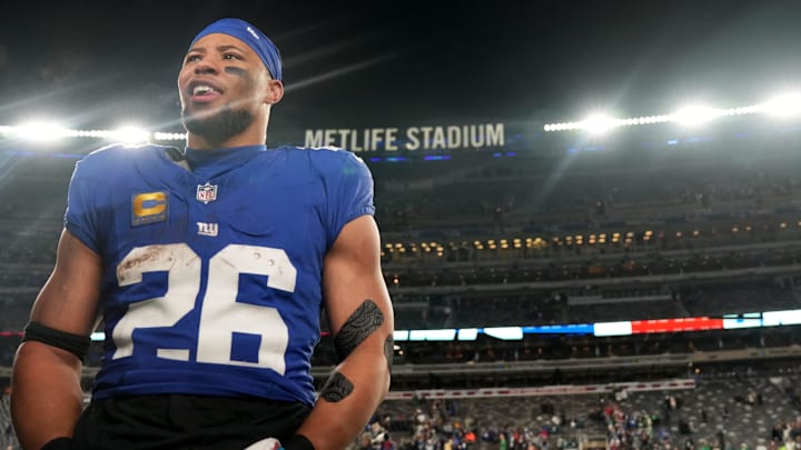 New York Giants running back Saquon Barkley (26) is shown on the field after the game, Sunday, January 7, 2024.
