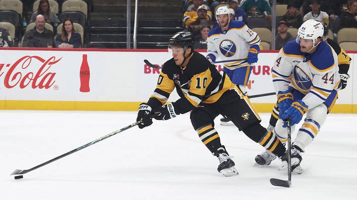 Sep 21, 2026; Pittsburgh, Pennsylvania, USA; Pittsburgh Penguins forward Andrei Kuzmenko (10) moves the puck against Buffalo Sabres defenseman Dennis Gilbert (44) during the first period at PPG Paints Arena. Mandatory Credit: Charles LeClaire-Imagn Images Sep 21, 2026; Pittsburgh, Pennsylvania, USA; Pittsburgh Penguins forward Andrei Kuzmenko (10) moves the puck against Buffalo Sabres defenseman Dennis Gilbert (44) during the first period at PPG Paints Arena. Mandatory Credit: Charles LeClaire-Imagn Images
