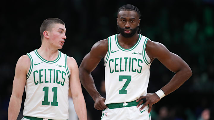 Boston Celtics forward Brown and guard Pritchard talk during the first half against the Memphis Grizzlies at TD Garden. 