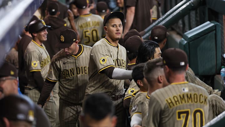 San Diego Padres third baseman Manny Machado (13) high fives teammates before playing against the Houston Astros at Daikin Park on Apr 19, 2025. San Diego Padres third baseman Manny Machado (13) high fives teammates before playing against the Houston Astros at Daikin Park on Apr 19, 2025.