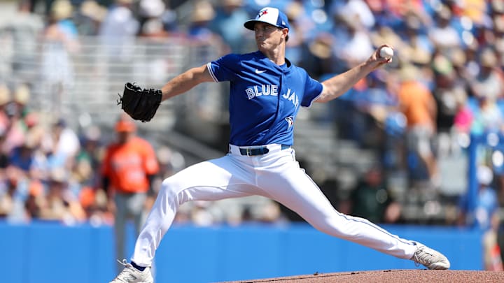 Mar 13, 2025:  Toronto Blue Jays pitcher Easton Lucas (62) throws a pitch against the Baltimore Orioles in the first inning during spring training at TD Ballpark. 