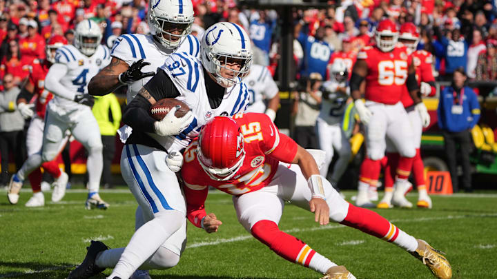 Nov 23, 2025; Kansas City, Missouri, USA; Indianapolis Colts defensive end Laiatu Latu (97) runs after an interception against Kansas City Chiefs quarterback Patrick Mahomes (15) in the first quarter at GEHA Field at Arrowhead Stadium. Mandatory Credit: Denny Medley-Imagn Images Nov 23, 2025; Kansas City, Missouri, USA; Indianapolis Colts defensive end Laiatu Latu (97) runs after an interception against Kansas City Chiefs quarterback Patrick Mahomes (15) in the first quarter at GEHA Field at Arrowhead Stadium. Mandatory Credit: Denny Medley-Imagn Images