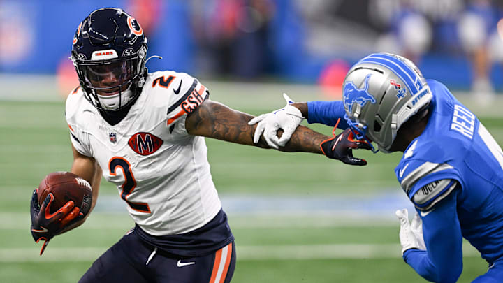 Chicago Bears wide receiver DJ Moore (2) carries the ball defended by Detroit Lions cornerback D.J. Reed (4) during the first quarter of the game at Ford Field.