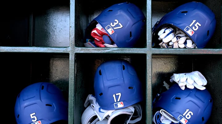Sep 3, 2024; Anaheim, California, USA; Los Angeles Dodgers batting helmets sit in their cubbies for game against the Los Angeles Angels at Angel Stadium. Mandatory Credit: Jayne Kamin-Oncea-Imagn Images