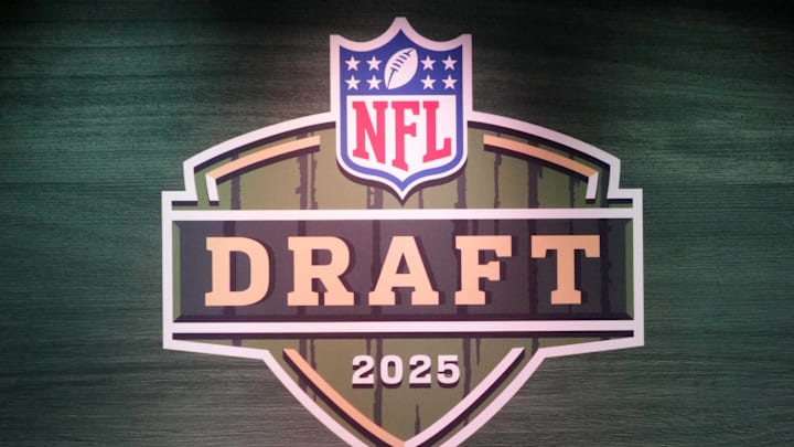 The 2025 NFL Draft logo on the main stage at Lambeau Field. 
