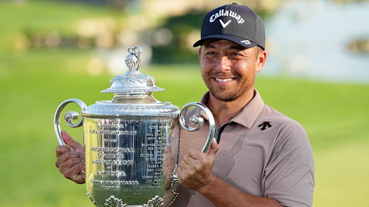 Xander Schauffele holds The Wanamaker Trophy after winning the PGA Championship golf tournament at Valhalla Golf Club.