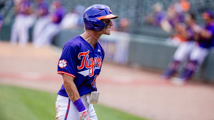 May 23, 2024; Charlotte, NC, USA; Clemson Tigers outfielder Cam Cannarella (10) celebrates after scoring in the eighth inning against the Miami (Fl) Hurricanes during the ACC Baseball Tournament at Truist Field. 