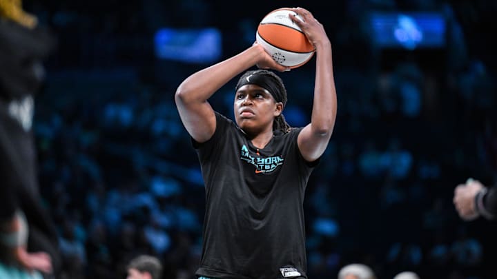Jun 19, 2025; Brooklyn, New York, USA; New York Liberty center Jonquel Jones (35) warms up before a game against the Phoenix Mercury at Barclays Center. Mandatory Credit: John Jones-Imagn Images