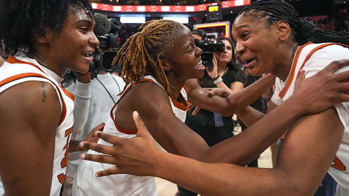 Texas Longhorns guards Madison Booker, Bryanna Preston, and Rori Harmon celebrate the 65-58 win over LSU at the Moody Center on Sunday, Feb. 16, 2025.