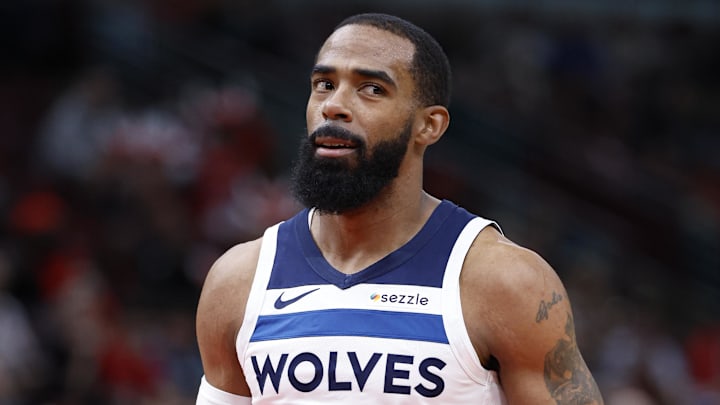 Nov 7, 2024; Chicago, Illinois, USA; Minnesota Timberwolves guard Mike Conley (10) reacts after shooting a free throw against the Chicago Bulls during the first half at United Center. Mandatory Credit: Kamil Krzaczynski-Imagn Images