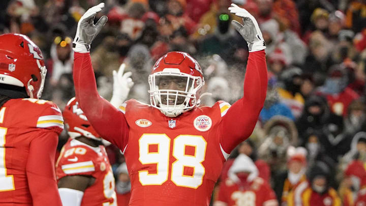 Jan 13, 2024; Kansas City, Missouri, USA; Kansas City Chiefs defensive tackle Tershawn Wharton (98) celebrates toward fans against the Miami Dolphins in a 2024 AFC wild card game at GEHA Field at Arrowhead Stadium. Mandatory Credit: Denny Medley-Imagn Images