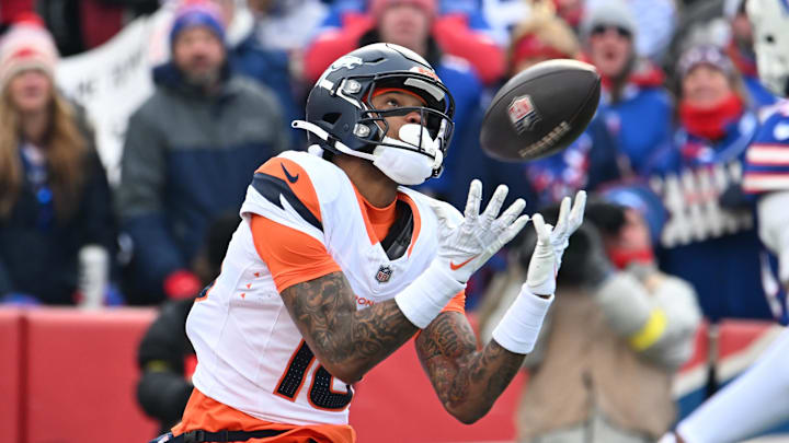 Denver Broncos wide receiver Troy Franklin (16) catches a touchdown pass against the Buffalo Bills during the first quarter in an AFC wild card game at Highmark Stadium. 