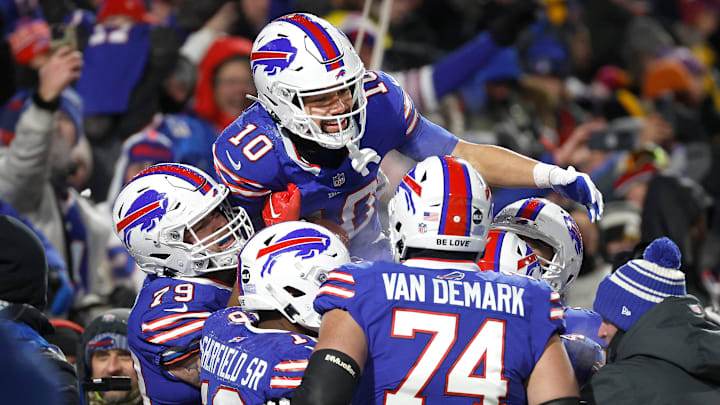 Buffalo Bills wide receiver Khalil Shakir (10) is hoisted onto the shoulders of teammates after his
