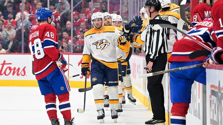 Nashville Predators forward Matthew Wood (71) celebrates with teammates after scoring a goal against the Montreal Canadiens during the second period at the Bell Centre.  Mandatory Credit: Eric Bolte-Imagn Images