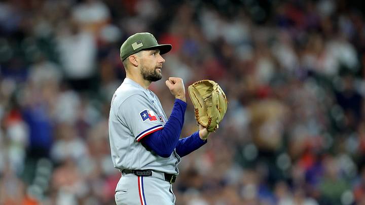 May 17, 2026; Houston, Texas, USA; Texas Rangers pitcher Nathan Eovaldi (17) reacts after a catch by right fielder Brandon Nimmo (24, not shown) against the Houston Astros during the fourth inning at Daikin Park. Mandatory Credit: Erik Williams-Imagn Images