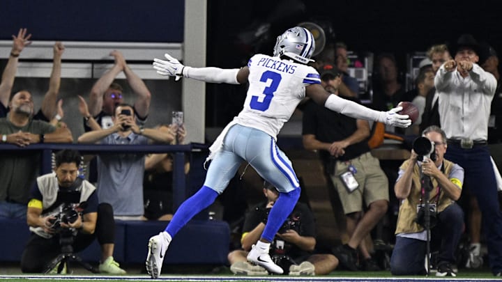 Dallas Cowboys wide receiver George Pickens celebrates after scoring a touchdown against the Green Bay Packers.