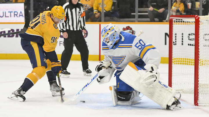 Dec 11, 2025; Nashville, Tennessee, USA; St. Louis Blues goaltender Jordan Binnington (50) blocks the shot of Nashville Predators center Steven Stamkos (91) during the first period at Bridgestone Arena. Mandatory Credit: Steve Roberts-Imagn Images Dec 11, 2025; Nashville, Tennessee, USA; St. Louis Blues goaltender Jordan Binnington (50) blocks the shot of Nashville Predators center Steven Stamkos (91) during the first period at Bridgestone Arena. Mandatory Credit: Steve Roberts-Imagn Images