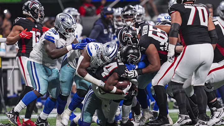 Atlanta Falcons wide receiver Ray-Ray McCloud III is tackled by Dallas Cowboys defensive tackle Osa Odighizuwa. Atlanta Falcons wide receiver Ray-Ray McCloud III is tackled by Dallas Cowboys defensive tackle Osa Odighizuwa.