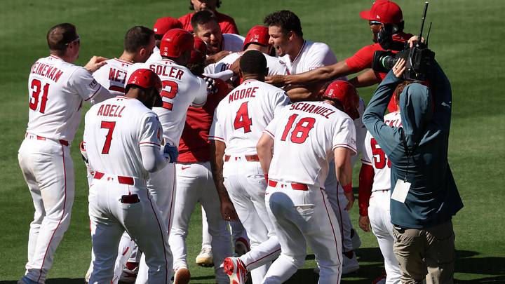 Jun 24, 2026; Anaheim, California, USA; Los Angeles Angels pinch hitter Logan O'Hoppe (14) is congratulated by teammates after a walk-off single during the tenth inning against the Baltimore Orioles at Angel Stadium. Mandatory Credit: Kiyoshi Mio-Imagn Images Jun 24, 2026; Anaheim, California, USA; Los Angeles Angels pinch hitter Logan O'Hoppe (14) is congratulated by teammates after a walk-off single during the tenth inning against the Baltimore Orioles at Angel Stadium. Mandatory Credit: Kiyoshi Mio-Imagn Images