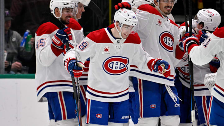 Jan 4, 2026; Dallas, Texas, USA; Montreal Canadiens defenseman Lane Hutson (48) celebrates with his teammates after he scores the game winning goal against the Dallas Stars during the overtime period at the American Airlines Center. Mandatory Credit: Jerome Miron-Imagn Images Jan 4, 2026; Dallas, Texas, USA; Montreal Canadiens defenseman Lane Hutson (48) celebrates with his teammates after he scores the game winning goal against the Dallas Stars during the overtime period at the American Airlines Center. Mandatory Credit: Jerome Miron-Imagn Images