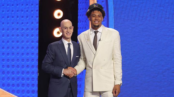 Jun 23, 2026; New York, NY, USA; NBA commissioner Adam Silver greets the eleventh pick in the 2026 NBA draft, Michigan forward Yaxel Lendeborg after he was selected by the Golden State Warriors at Barclays Center. Mandatory Credit: Brad Penner-Imagn Images