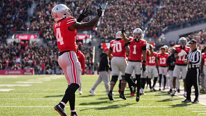 Ohio State Buckeyes wide receiver Jeremiah Smith (4) celebrates a touchdown during the NCAA football game against the Penn State Nittany Lions at Ohio Stadium in Columbus on Nov. 1, 2025.