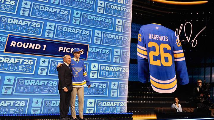 Jun 26, 2026; Buffalo, New York, USA; Maddox Dagenais reacts beside NHL commissioner Gary Bettman after being selected with the sixteenth pick in the first round of the 2026 NHL Draft by the St. Louis Blues at KeyBank Center. Mandatory Credit: Timothy T. Ludwig-Imagn Images